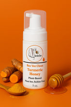 Load image into Gallery viewer, Bee Vee Clean Turmeric Honey foaming face wash in a white pump bottle, with turmeric roots and powder, and honey on a dipper.
